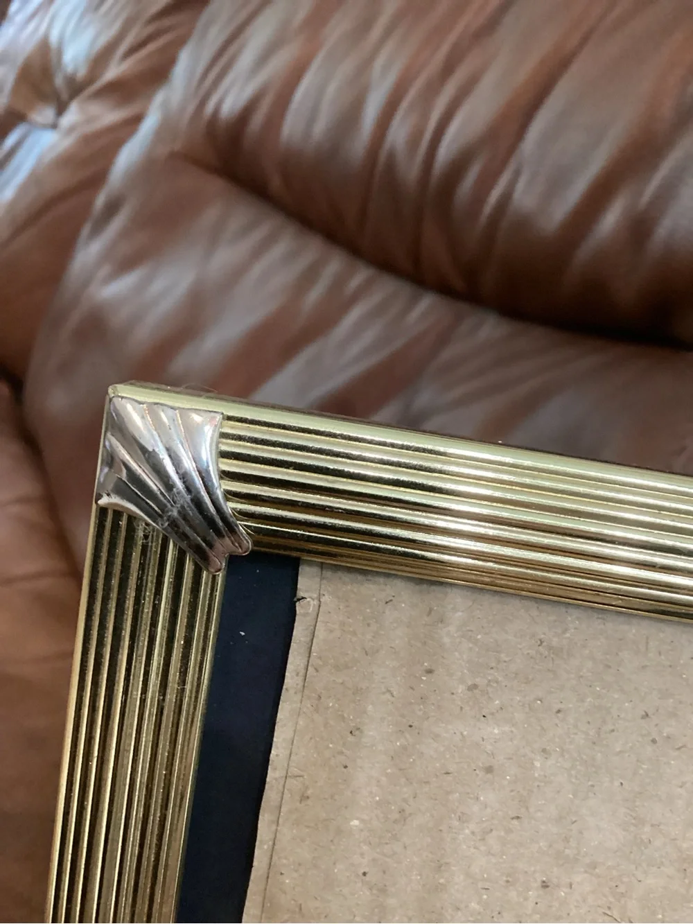 Gold Ribbed Photo Frame with silver accents holds a 5x7